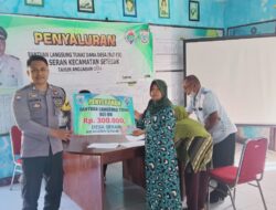 Bhabinkamtibmas Desa Seran Dampingi Masyarakat Penerima BLT-DD