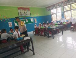 Polri Hadir! Penyaluran Makanan Bergizi Gratis di SDN 2 Ombe Lancar